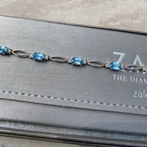 Oval Blue Topaz & Diamond Accent Bracelet